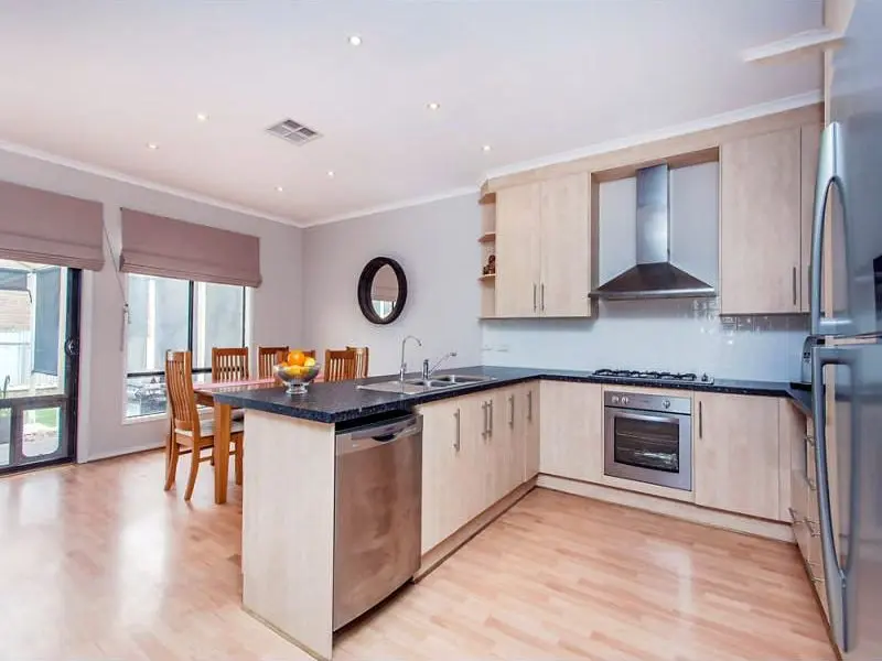 The kitchen at the Condamine Street home, with a breakfast bar