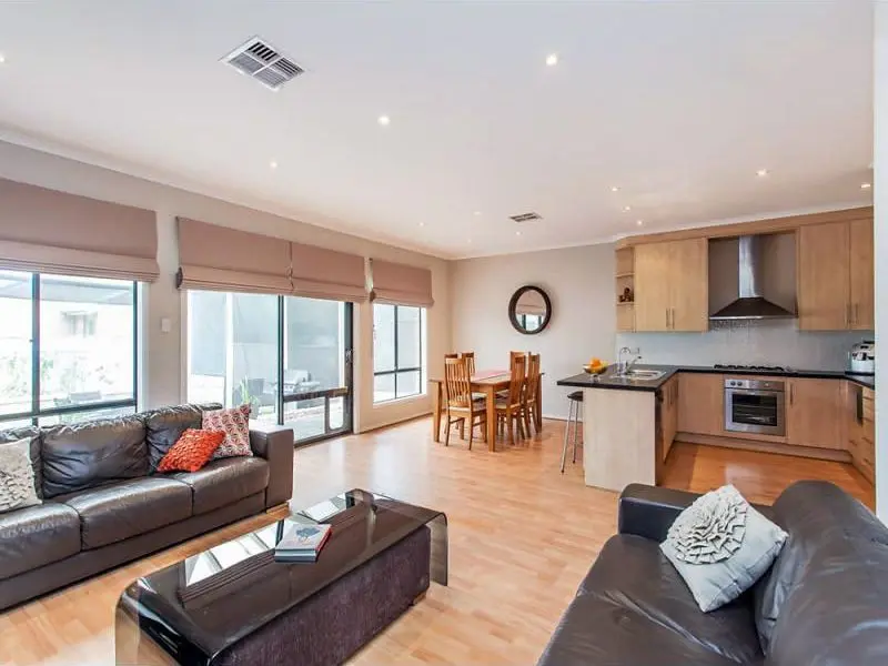 The open-plan living area at the Condamine Street home, looking through to the kitchen
