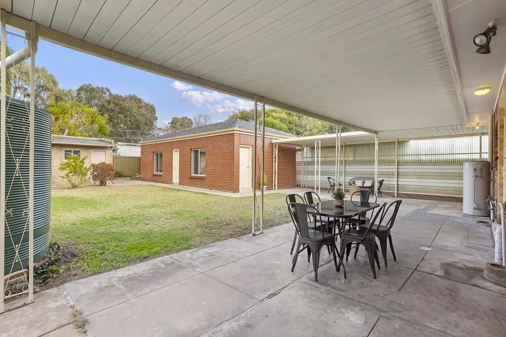 The covered outdoor area at the Colton Avenue home, looking across the back garden