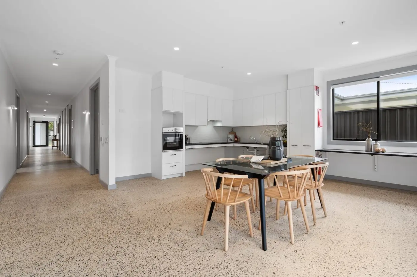 The kitchen and dining area at the Wyndham Road home, with wide clear floor space